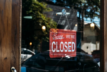 closed sign on front of business door
