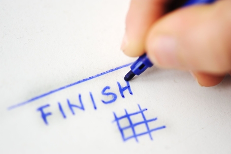 The Word "Finish" Written in Blue Pen